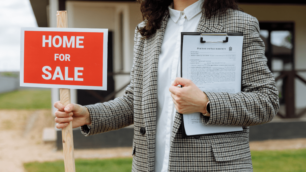 a person holding a sign