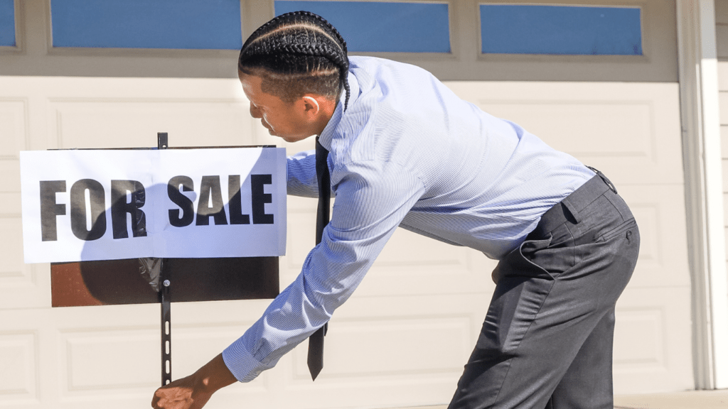 a person holding a sign